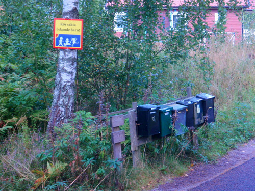 Mail boxes and a Children on Road Warning.